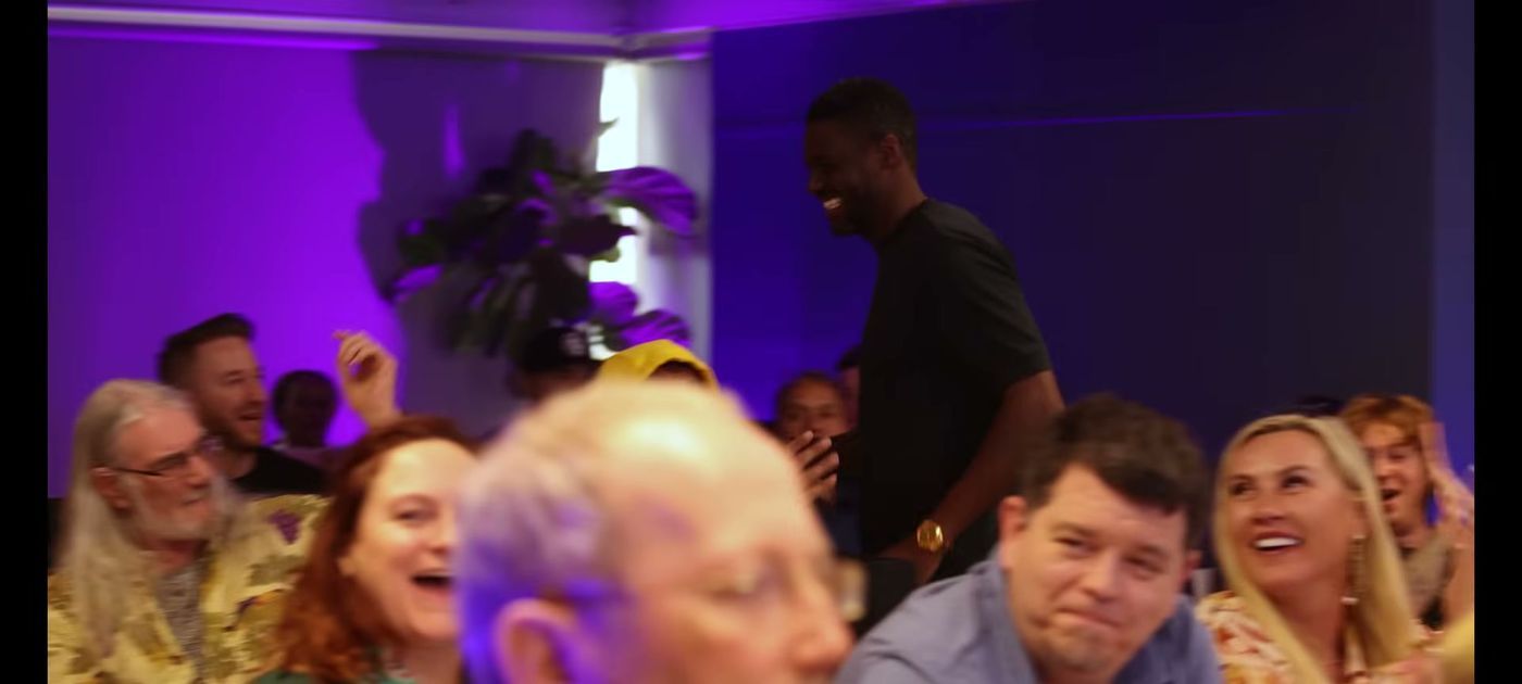 The room laughing together